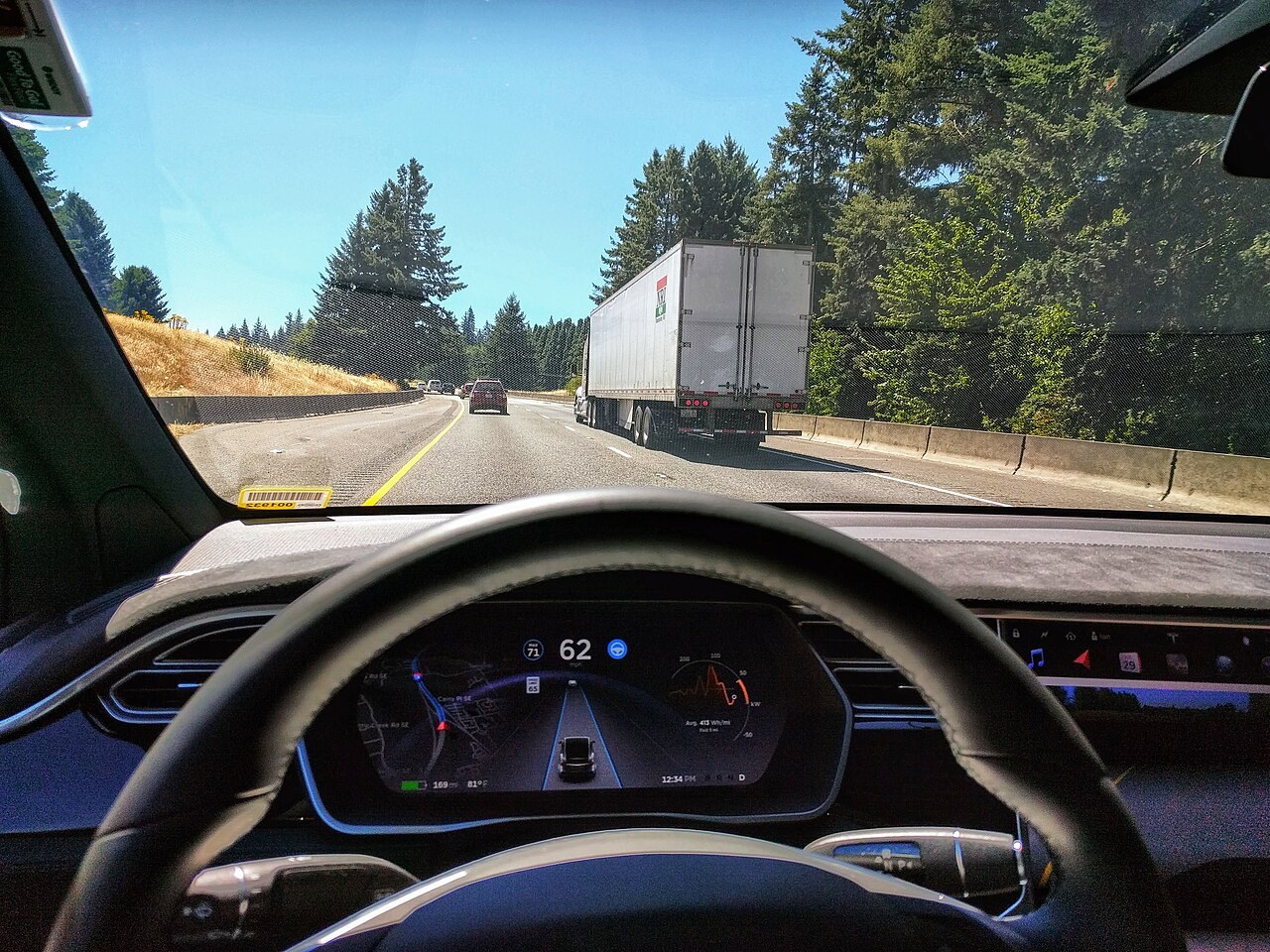 A Model X dashboard during Autopilot use, July 29, 2017. Historical interface context; the photograph is not evidence of present-day capability or safety.
