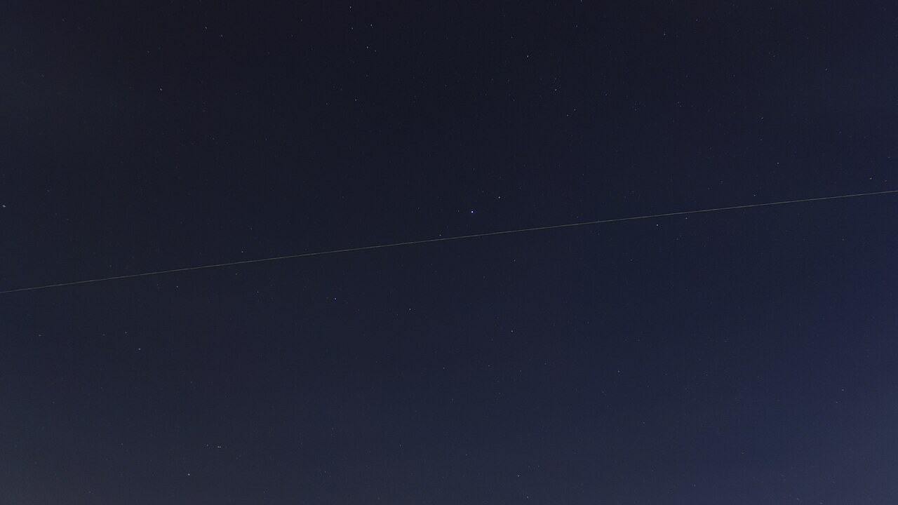 A composite of 58 one-second exposures showing a Starlink train passing near Altair, November 11, 2019. A composite night-sky observation, not a single instantaneous view.