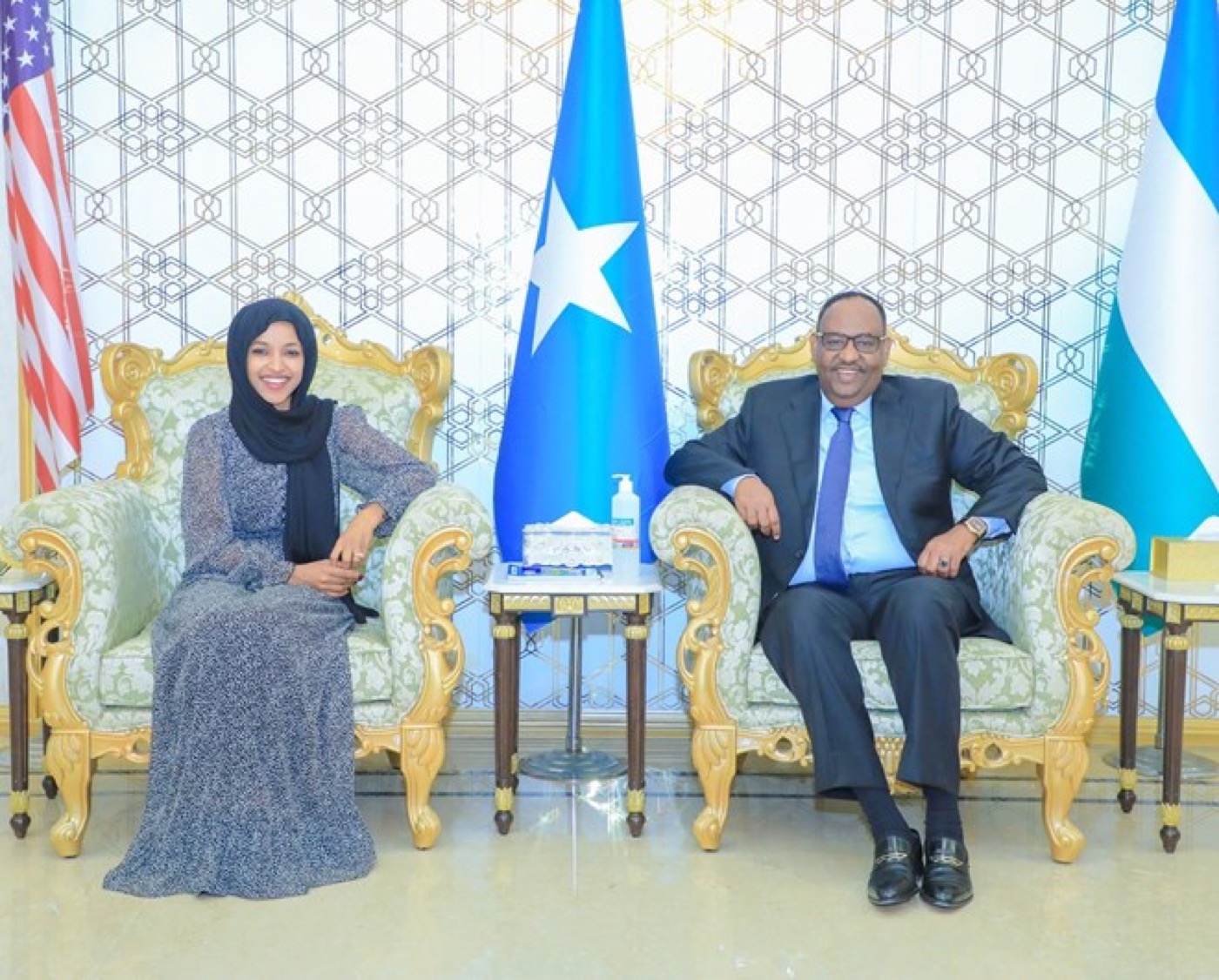 Ilhan Omar (left) meets Puntland President Said Deni in Garowe, Somalia, 22 December 2022. This later public meeting does not depict her father or establish anything about an alleged atrocity.